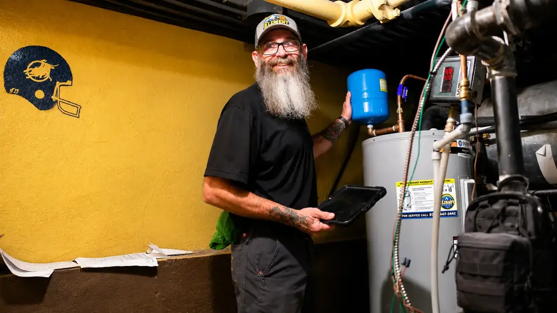 Water heater maintenance and expansion tank inspection